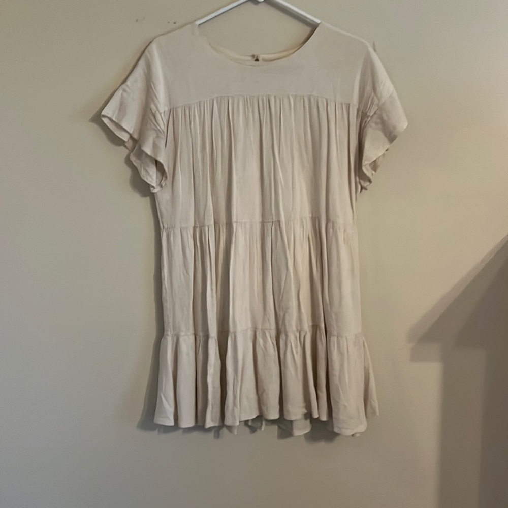 Cream mini dress from Roolee